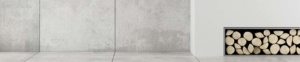 A concrete wall with a white floor and some cement