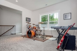 A room with a bunch of drums in it