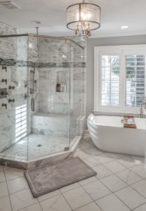A large bathroom with a tub and shower.