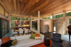 A living room with a couch and chairs