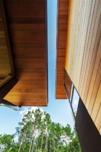 A view of the sky from inside a house.