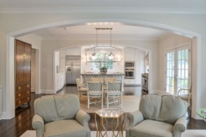 A living room with two chairs and a table
