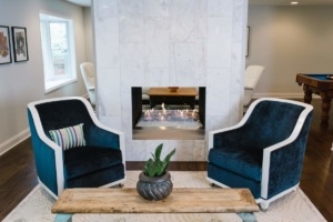 Two Blue Color Velvet Sofas In Front Of Each Other
