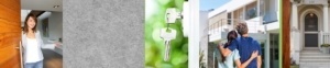 A pair of keys hanging from the handle of a door.