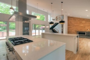 A kitchen with a stove and counter in it