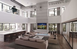 A modern city living room with couches and a television.