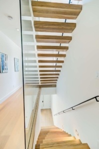 A view of the bottom part of a staircase.