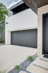 A garage door that is open and has no windows.