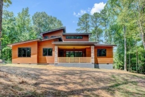 A large house with a lot of windows and doors