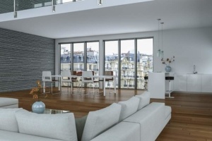A living room with large windows and white furniture.