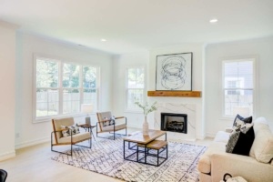A living room with white walls and furniture.