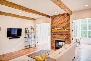 A living room with a fireplace and a couch