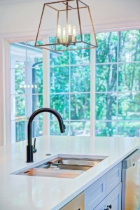 A kitchen with a sink and window in it