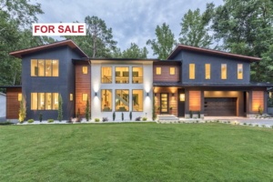 A large house with lots of windows and doors.