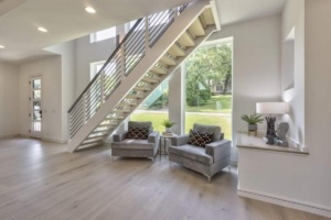 A living room with two chairs and a table