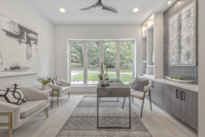 A living room with two chairs and a table