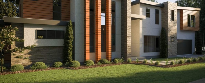 A large modern style house with grass in front of it.