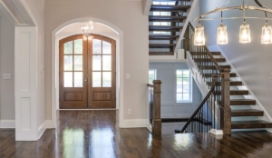 A large open door leads to the stairs.