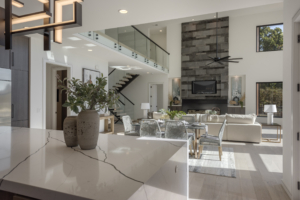 A large open living room with a fireplace.