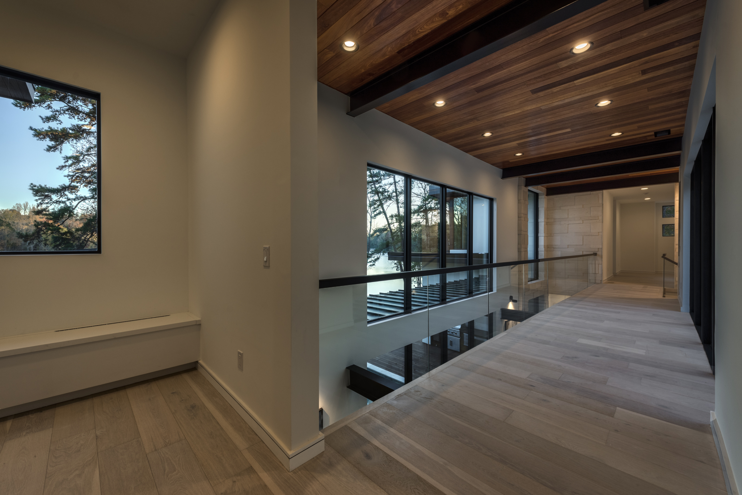 A large open room with wood ceiling and walls.