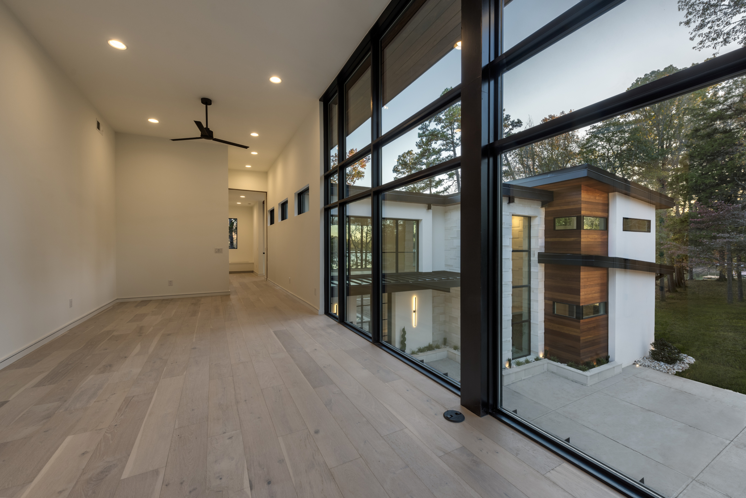 A large open floor plan with sliding glass doors.