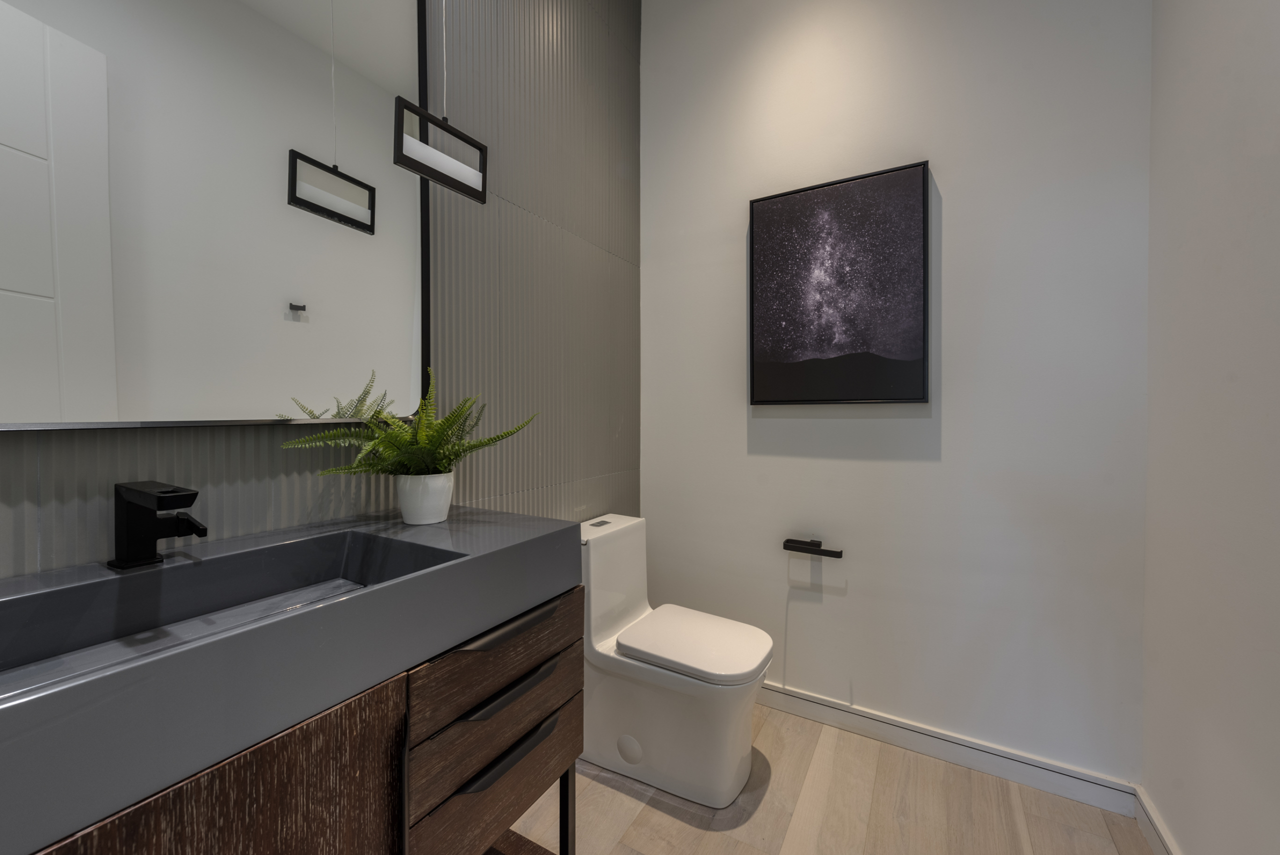Modern bathroom with gray and wood vanity