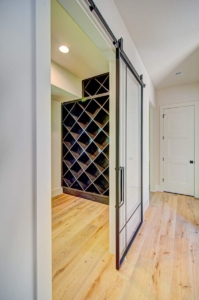 A view of a wine cellar from the hallway.