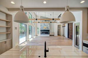 A large open room with two lights hanging from the ceiling.