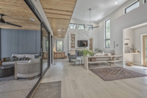 A large open living room with sliding glass doors.
