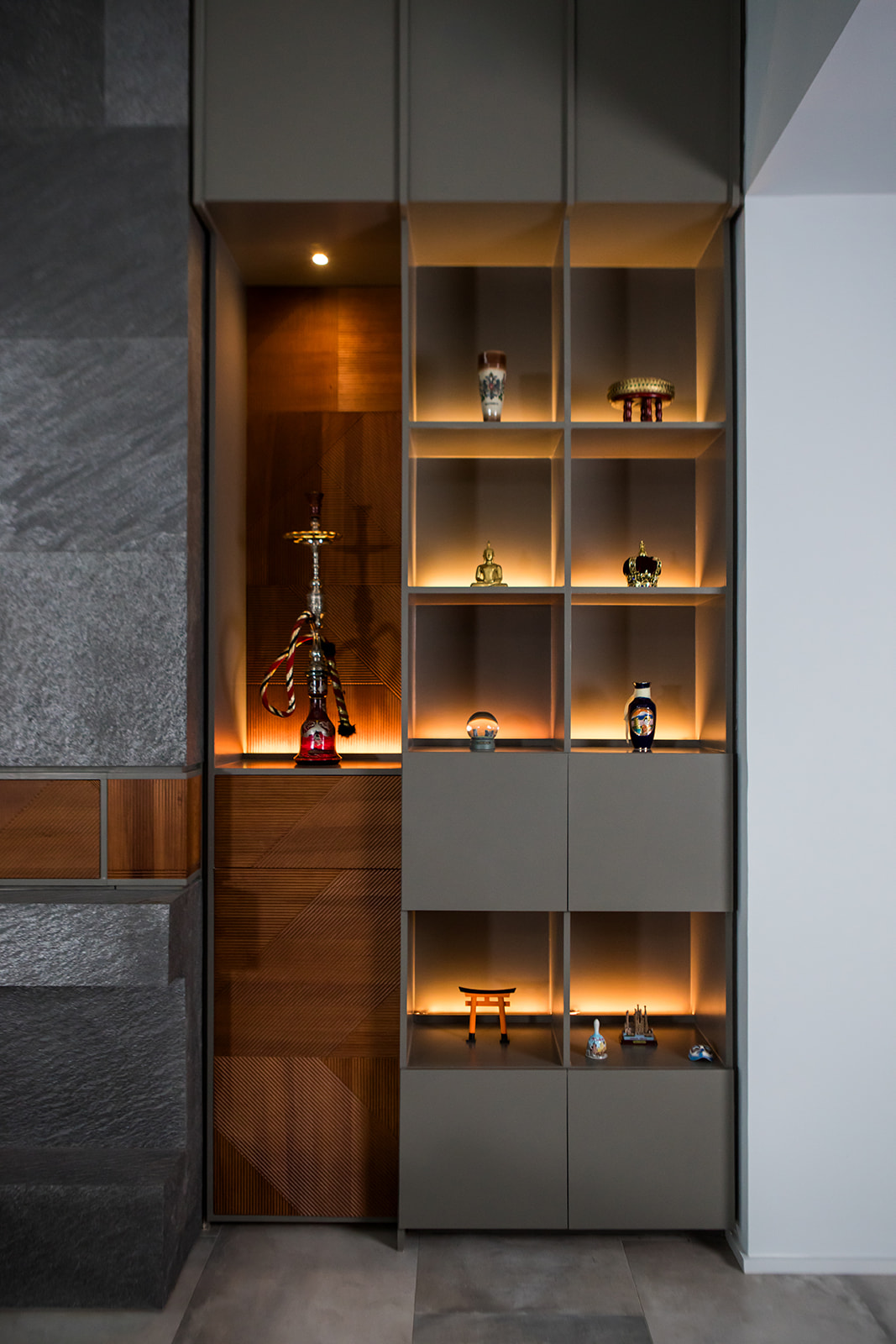 Modern shelf design with natural wood detail, gray cabinets and back lights